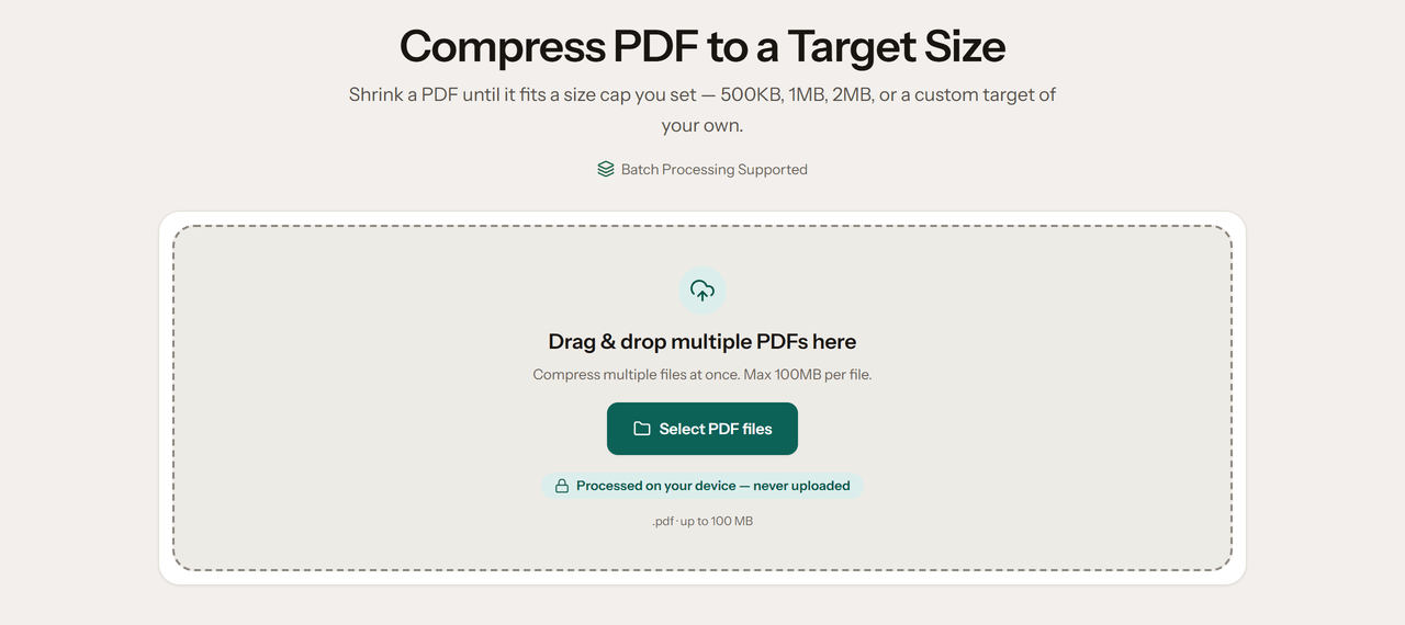 The Compress PDF drop zone, with a Select PDF files button and a note that files are processed on your device.
